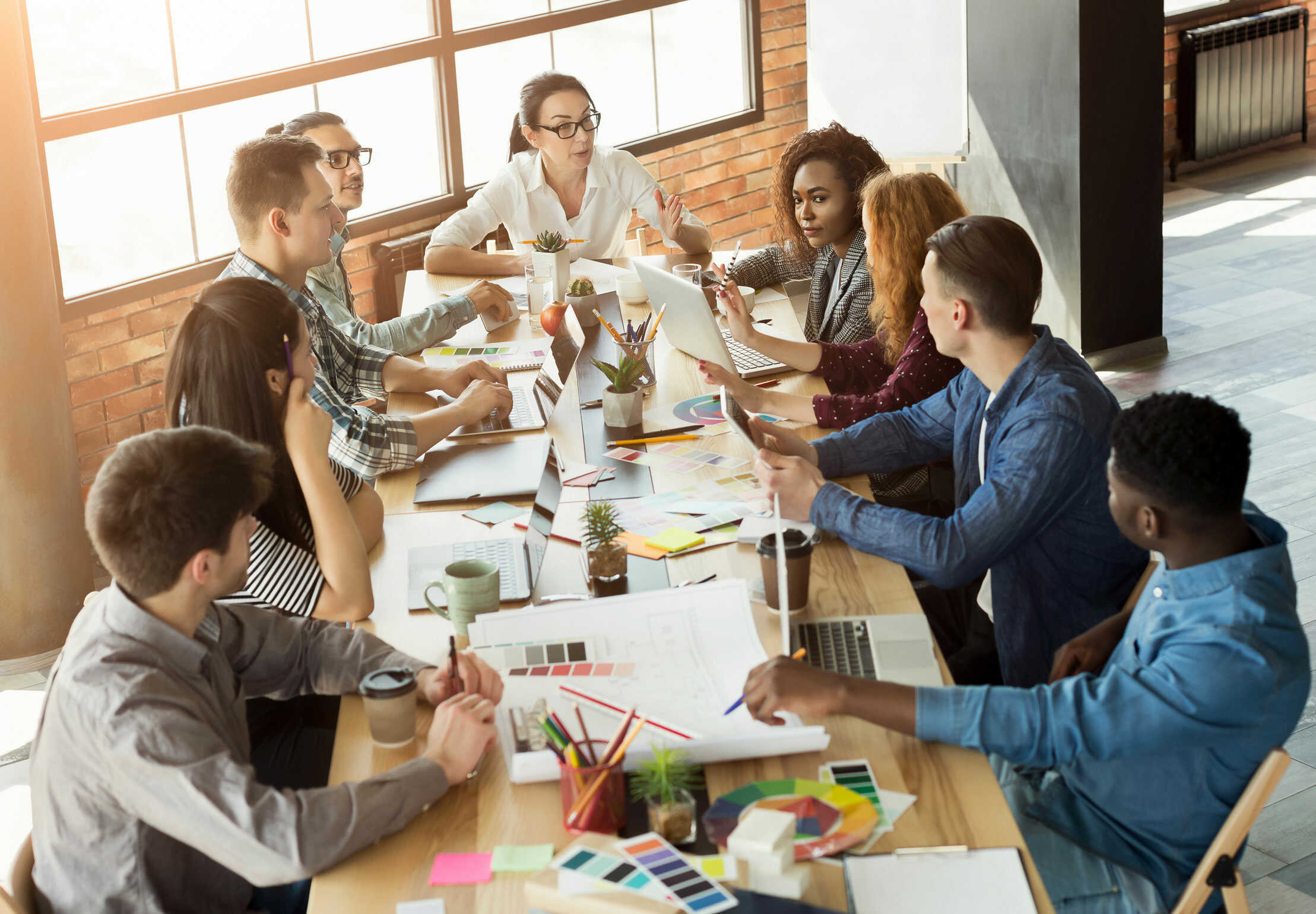 A table of campaign marketeers strategising